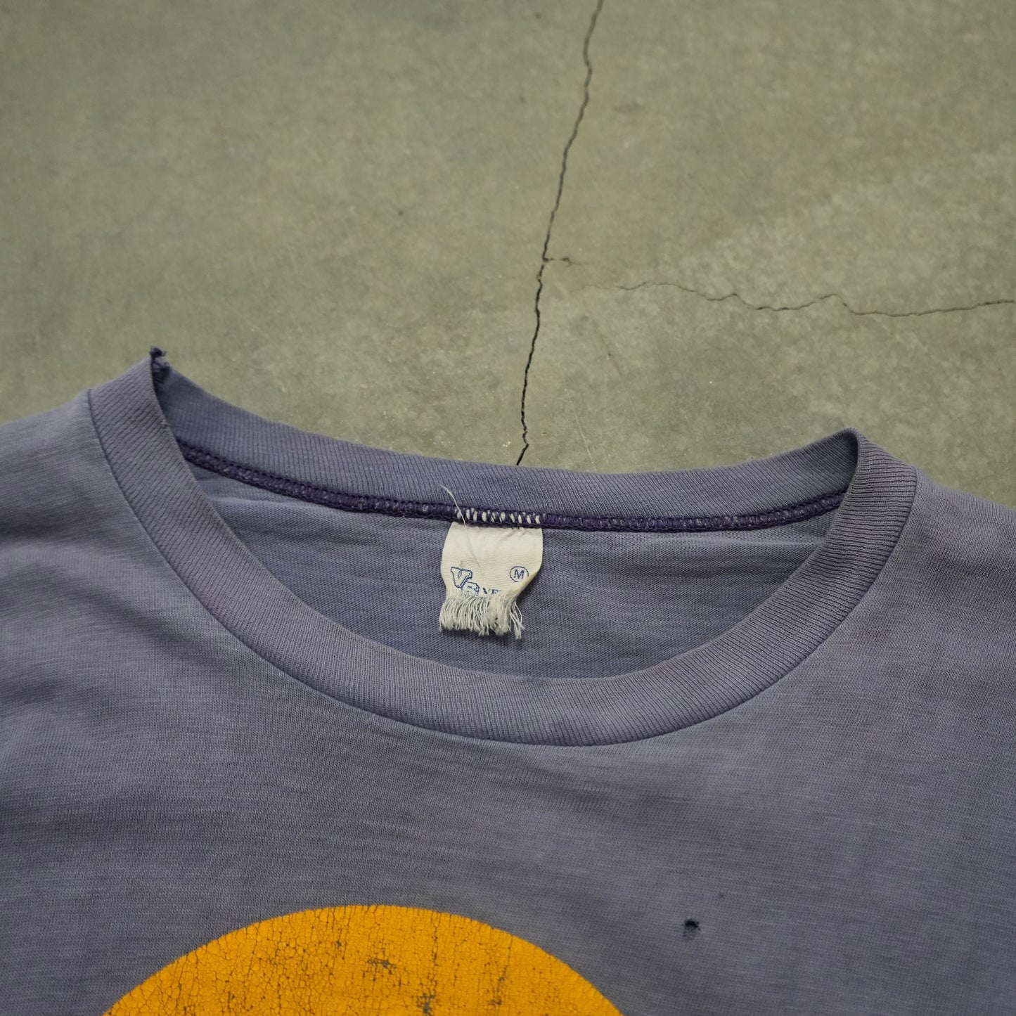 60s faded smiley face tee