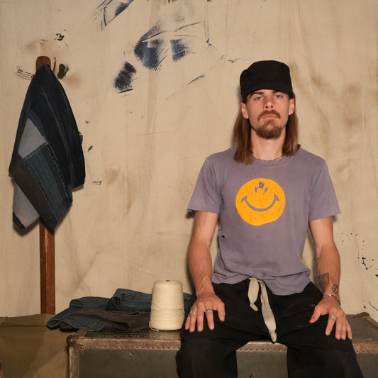 60s faded smiley face tee