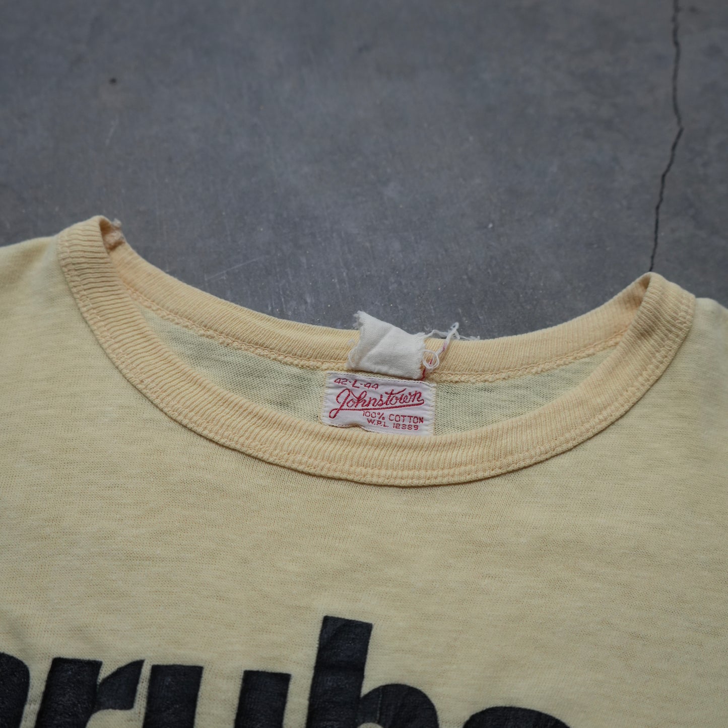 50s faded yellow aruba tee