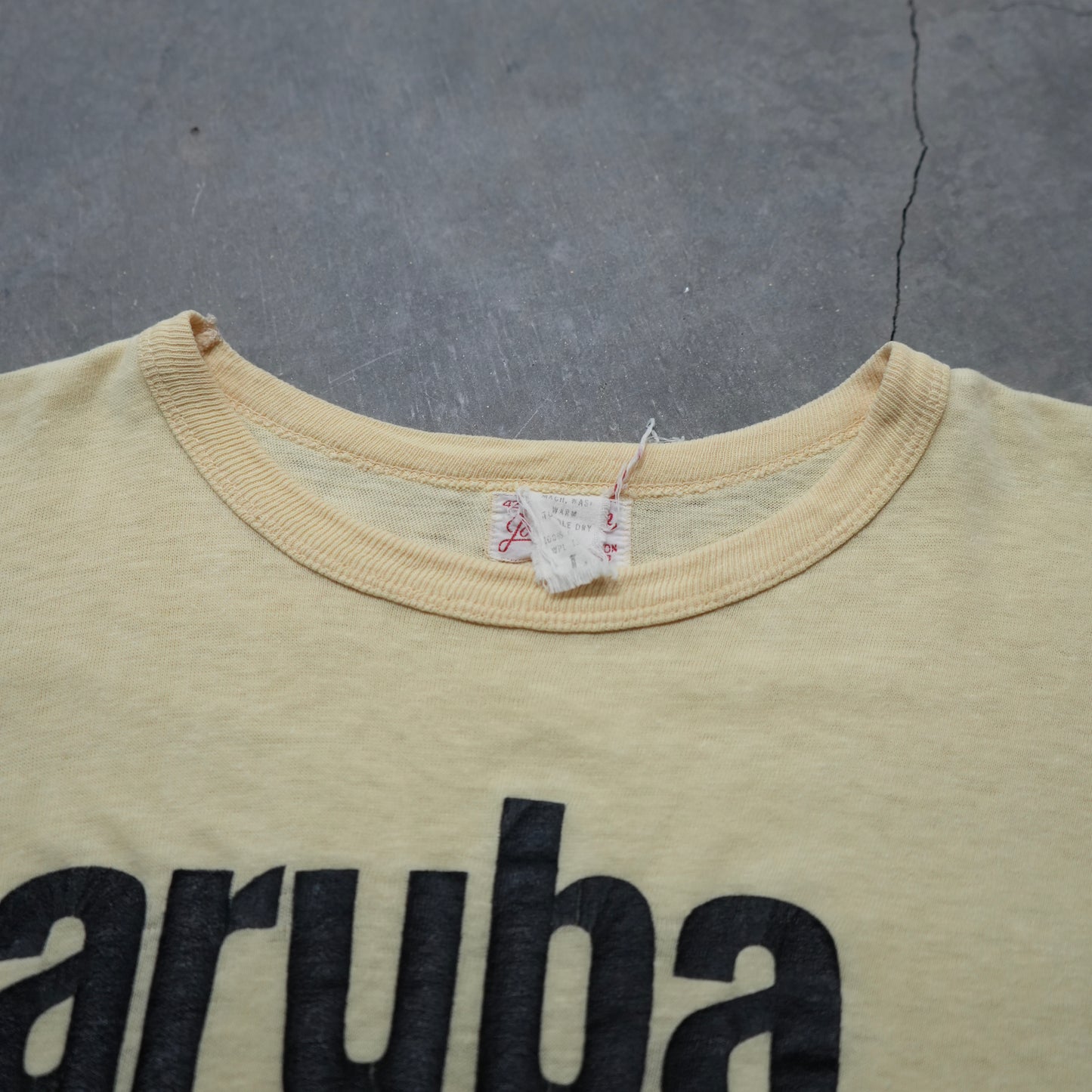 50s faded yellow aruba tee