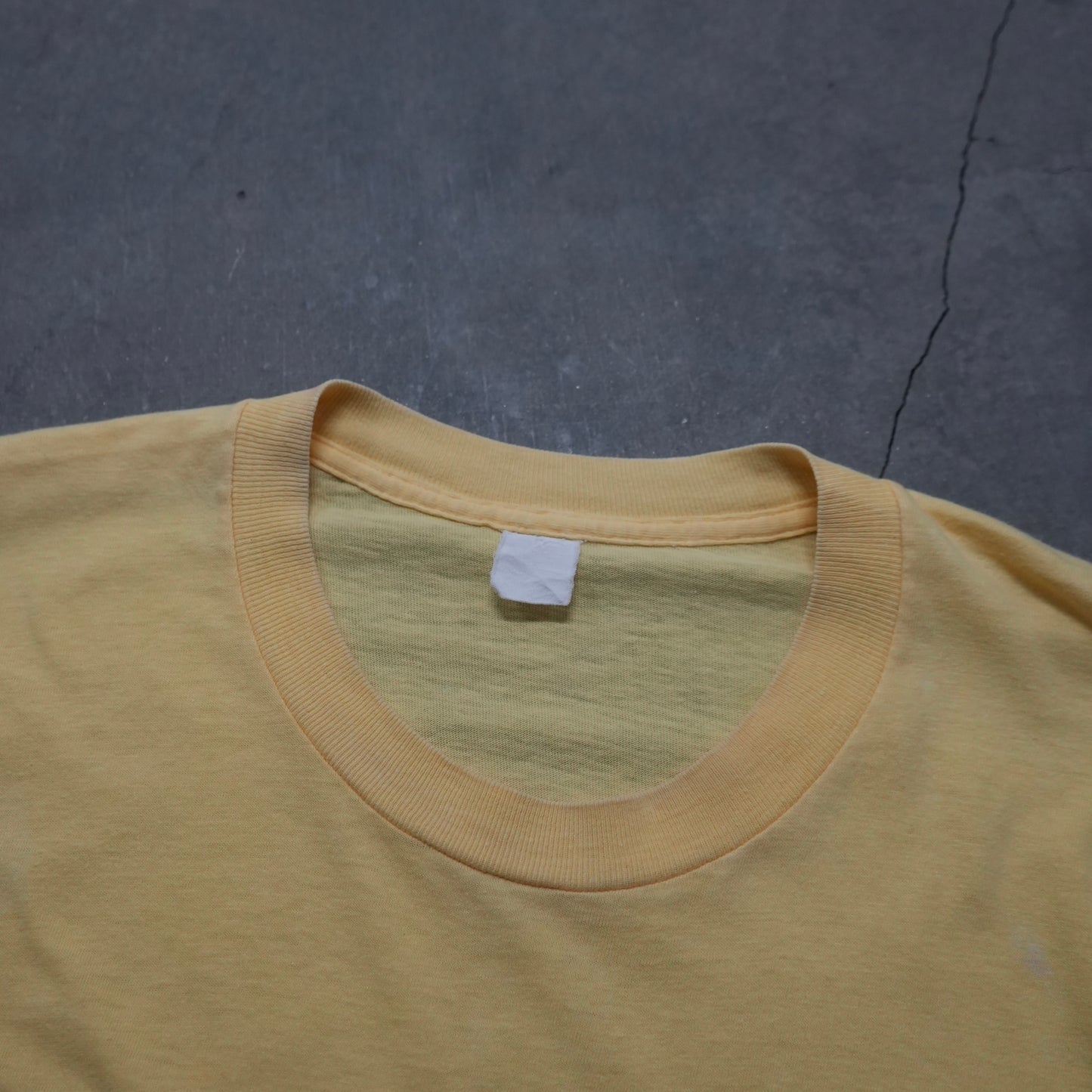 70s yellow pocket tee