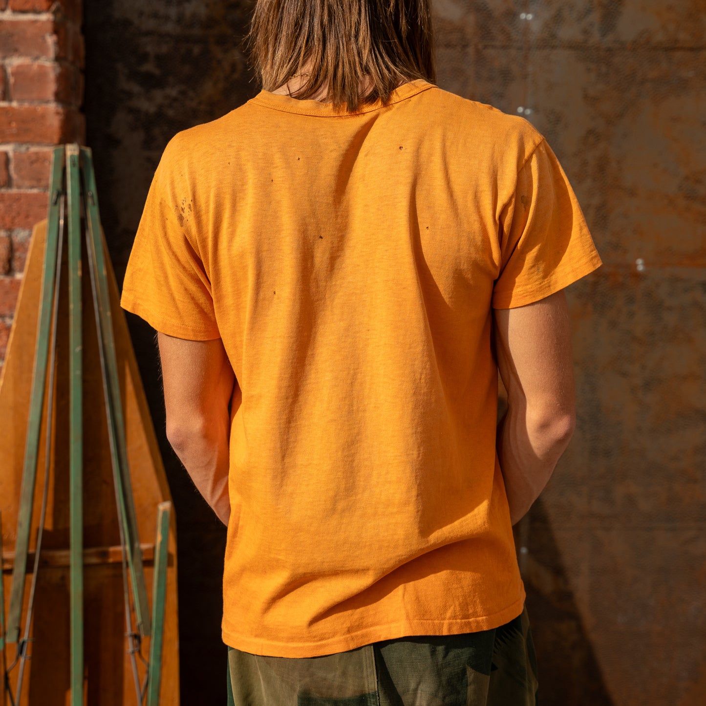 60s faded orange tee